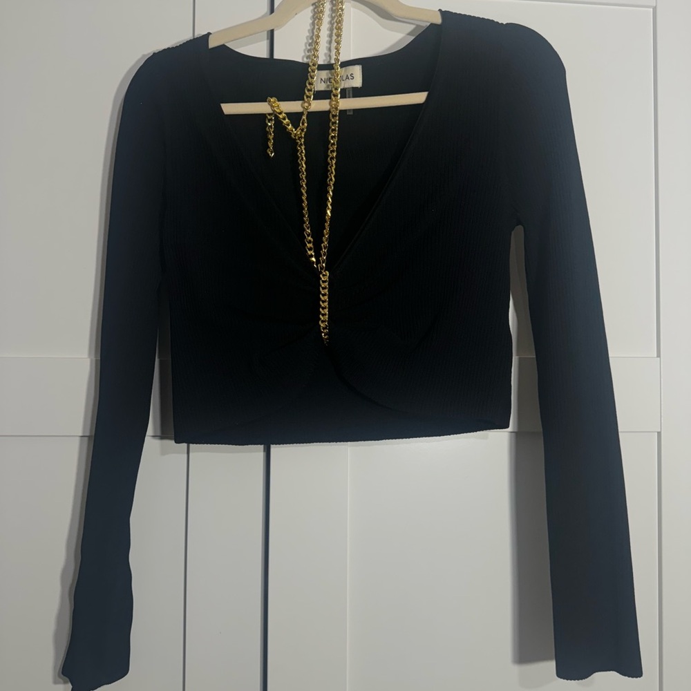 ALMA TOP IN BLACK
NICHOLAS
Color: Black size S